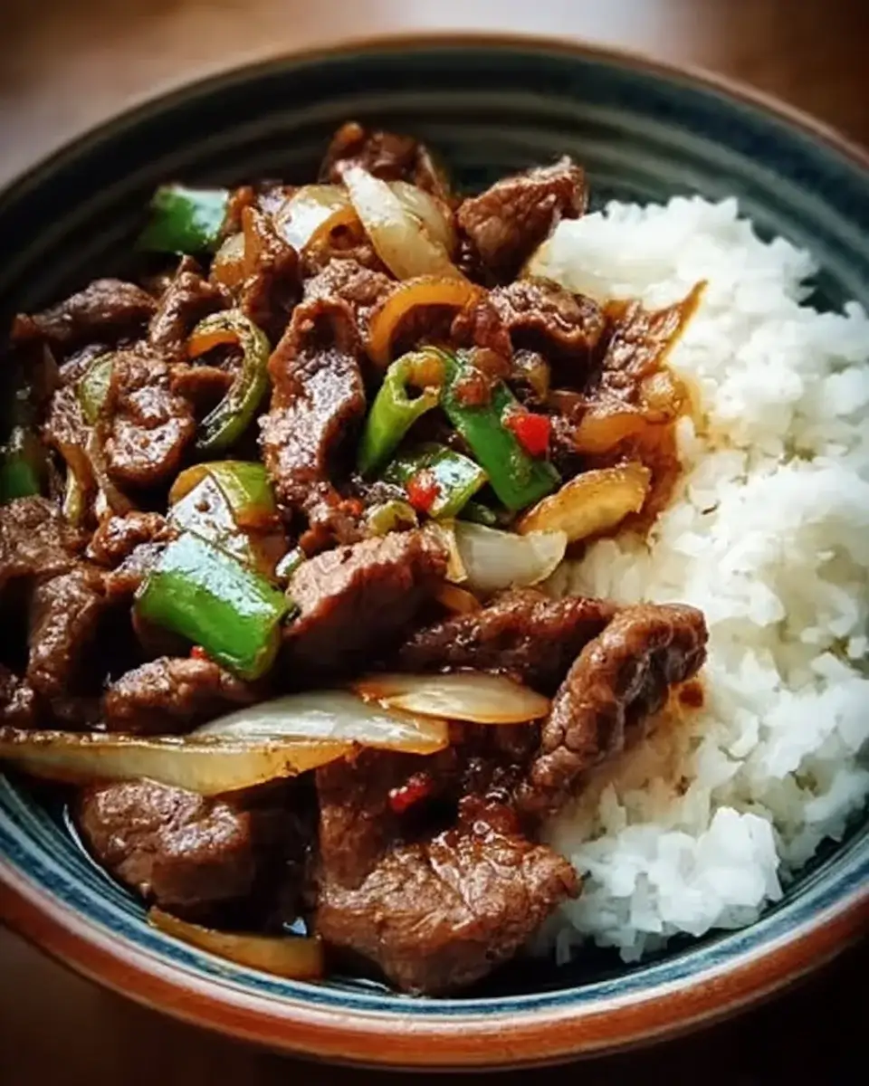 Chinesisches Rindfleisch mit Zwiebeln: So gelingt's perfekt!